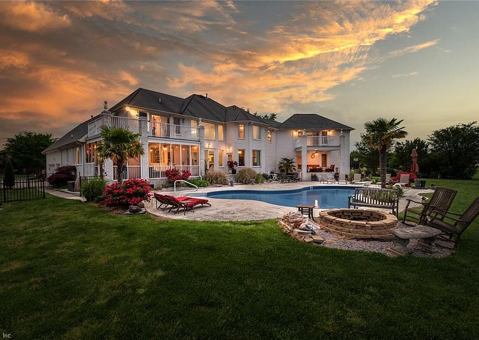 Over 6,000 square feet of beautiful renovated and updated space on 0.70 acres with a breathtaking backyard including a pool, lake views and on the 9th hole of Heron Ridge's award winning golf course.