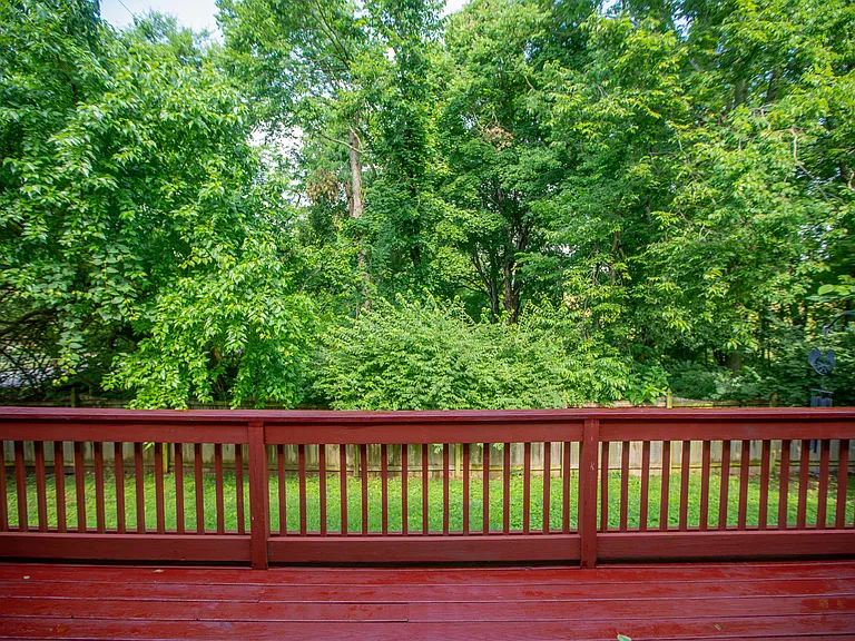 Private Wooded Backyard with Scenic Views and no homes directly behind the property, offering exceptional privacy and a peaceful natural setting
