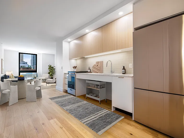 Welcome to 240 Willoughby, where modern design meets comfort. This stunning kitchen features sleek appliances, stylish cabinetry, and an inviting layout perfect for entertaining. Elevate your living herea"schedule a tour today!