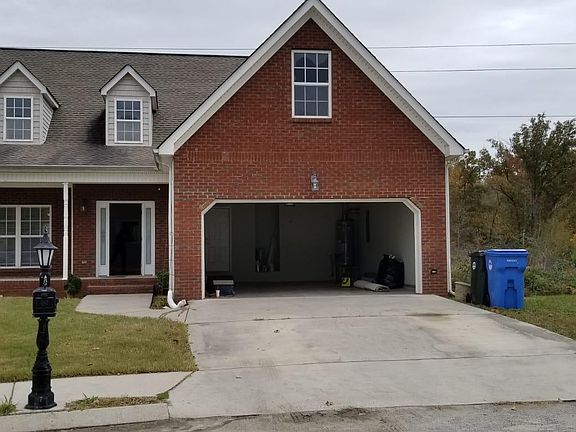 2 car garage and front of the house