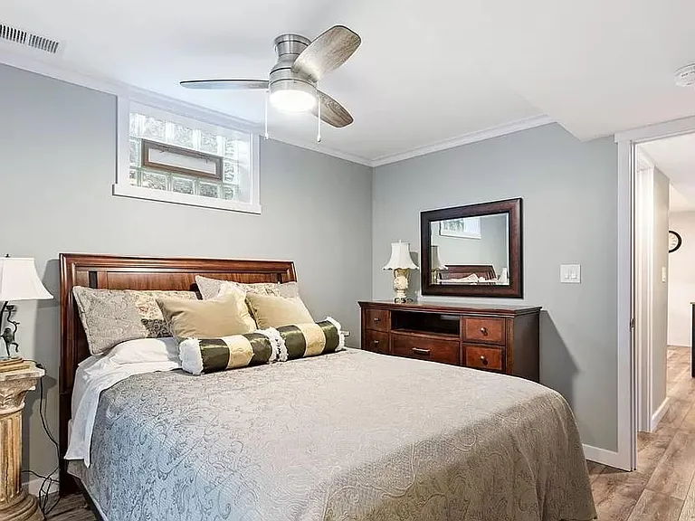 Downstairs 2nd bedroom, opens to second living area/family room