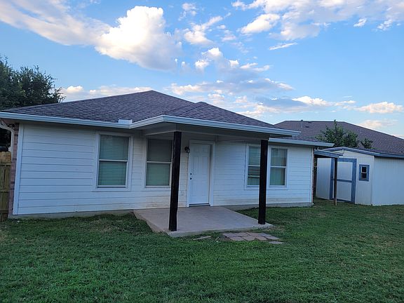 Backyard with storage shed