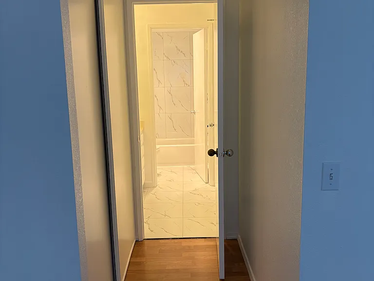 Master bedroom secondary closet and hallway