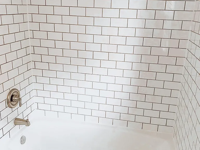 Bathroom with subway tile.