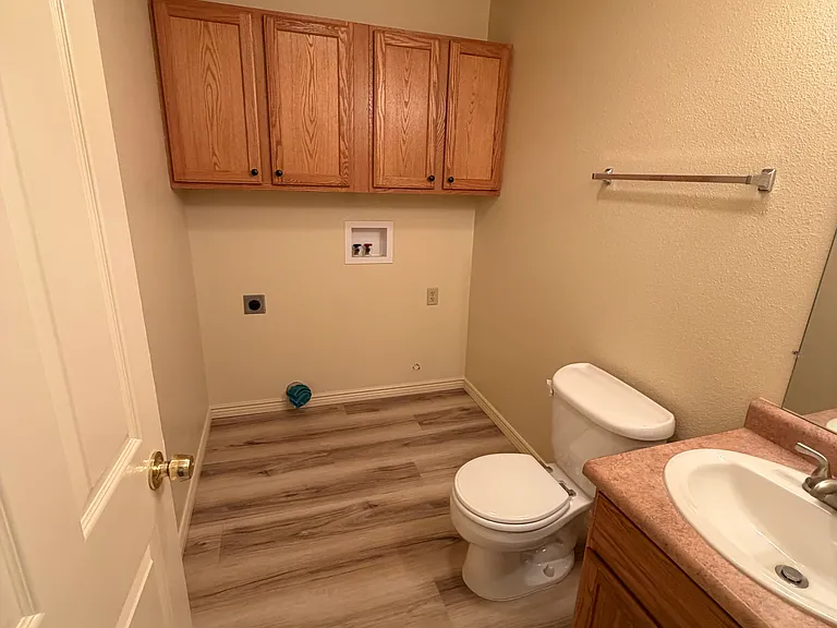 Laundry room and half bath.