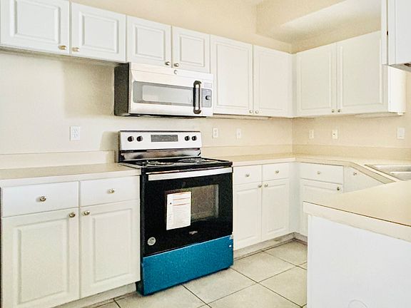 5th image of 5506 Metrowest Blvd #13-203