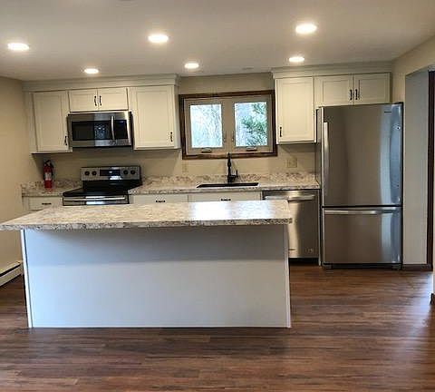 New kitchen cabinets and all new appliances. Wood look vinyl flooring