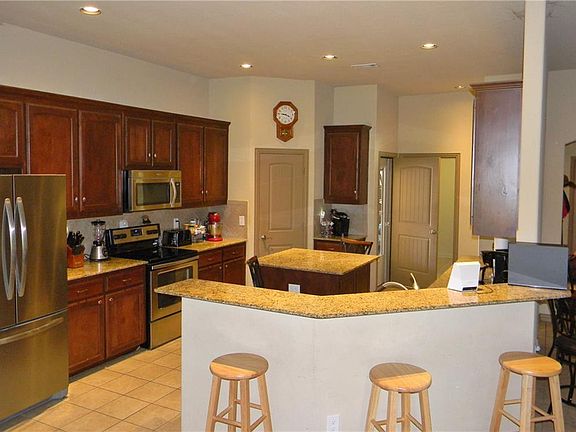 Large Island Kitchen with Granite counters.