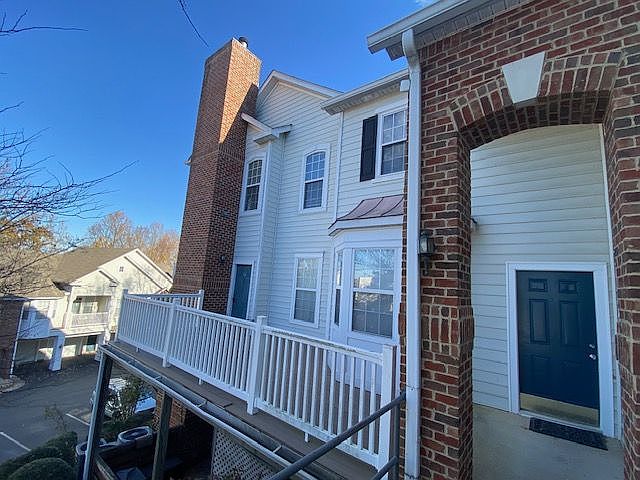 Exterior view of upper level condominium.