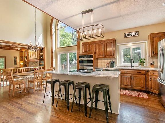 Light and bright kitchen with new custom island and updated lighting.