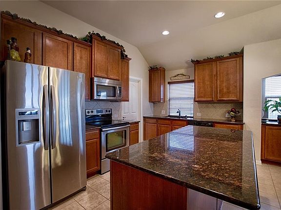 Open kitchen with island and tons of counter space