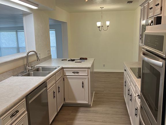 Kitchen new appliances with Refrigerator.