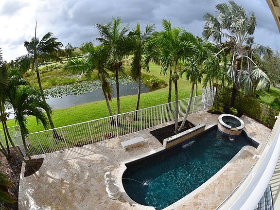 Back yard from covered balcony