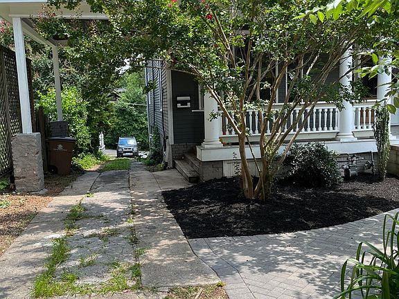 carport for covered parking & pull through driveway