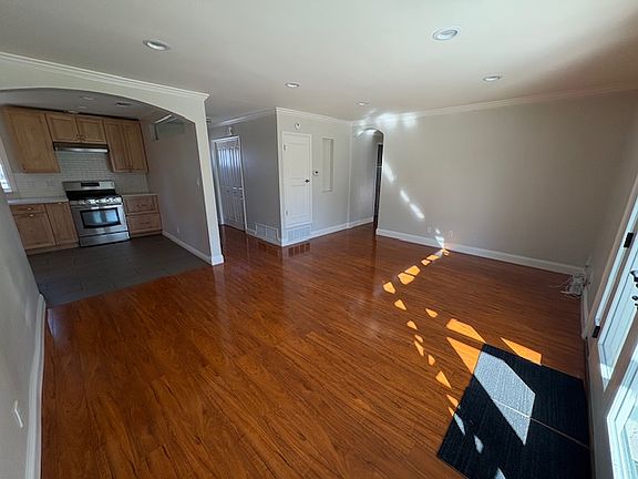 Living/dining room looking into kitchen