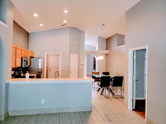 Bright eat-in-kitchen, opens to both living room and family room