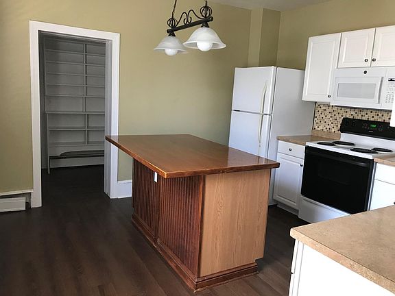 Kitchen looking into laundry room.