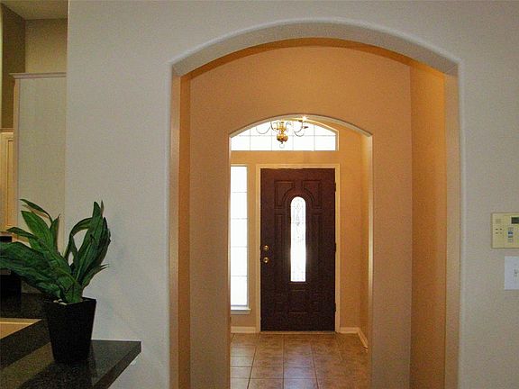 inviting arched entryway.