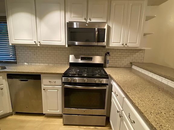Kitchen has Dishwasher, Fridge, Microwave and Stove all stainless steal.