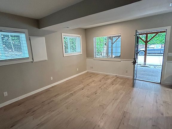 Large living space with a ton of natural light