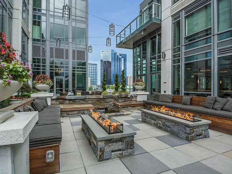Sit fireside while taking in incredible nature and Bellevue skyline views