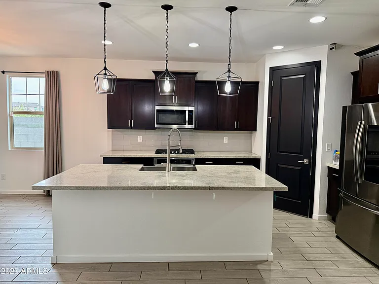 11002 W Marguerite Ave — Photo 4