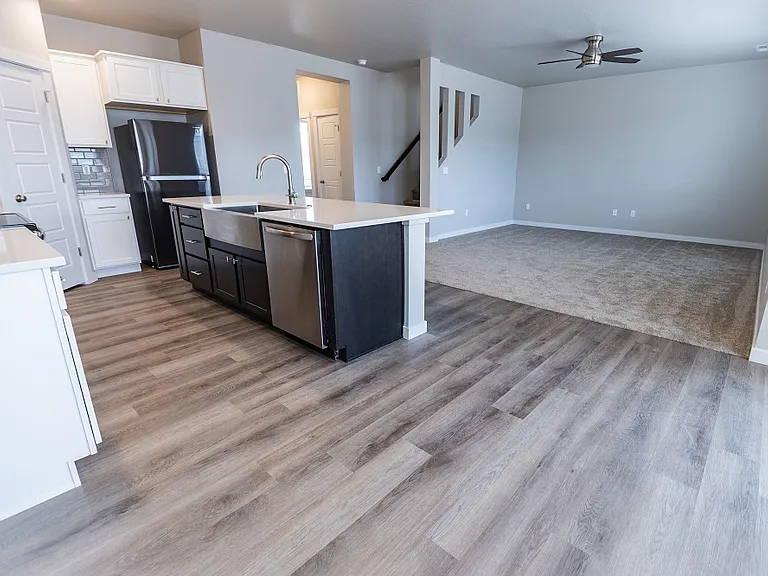 Plenty of room and wall space for your furniture and TV in the living room area.