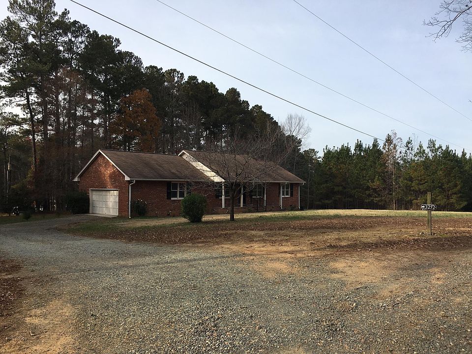 Front of house with large yard. House sits off of Rose of Sharon Rd in private location.