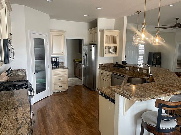Kitchen. Leads to laundry room and garage.