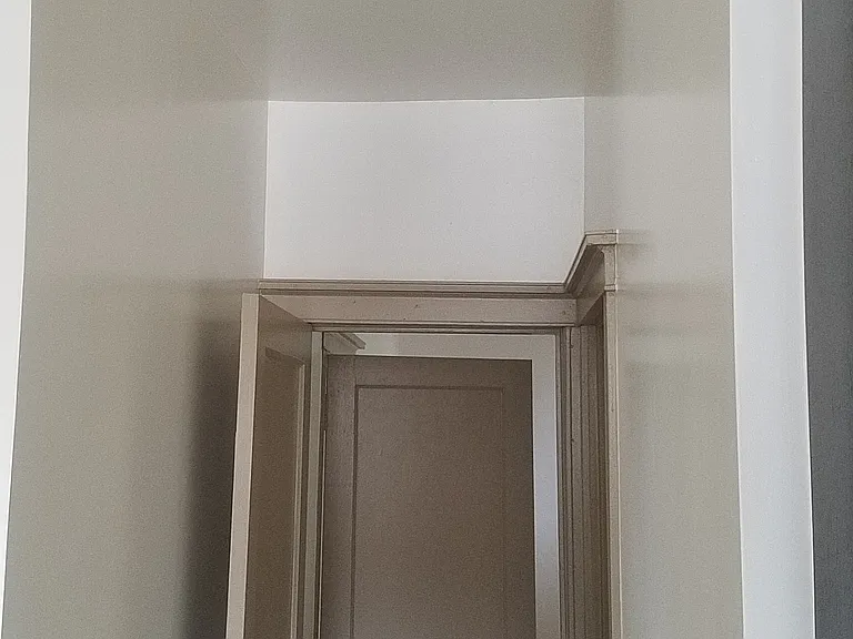 Hall between bedroom, bathroom and kitchen