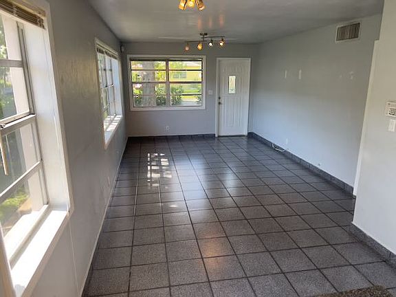 View from kitchen into dining area and living room.