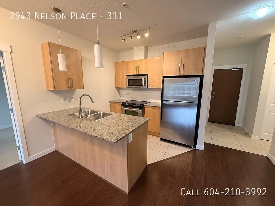 Building Photo - 2943 Nelson Pl #311