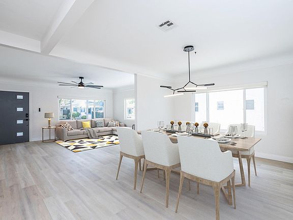 Virtual staging of living room and dining room, open concept plan.