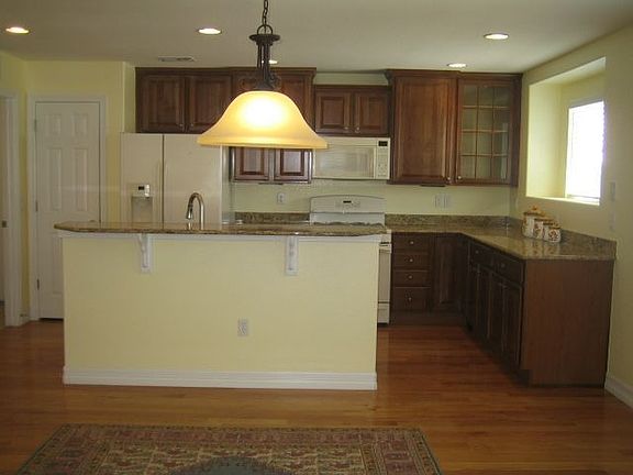 Wood Floors in Huge Eat-in Kitchen