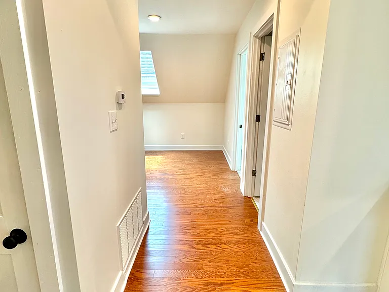 Looking into the living room from the kitchen dining nook