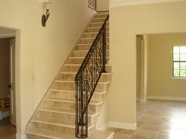 Marble Staircase leads to 2 bedrooms