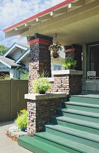 The front porch is a lovely place to watch the world go by, and is large enough to hold a full-size couch!