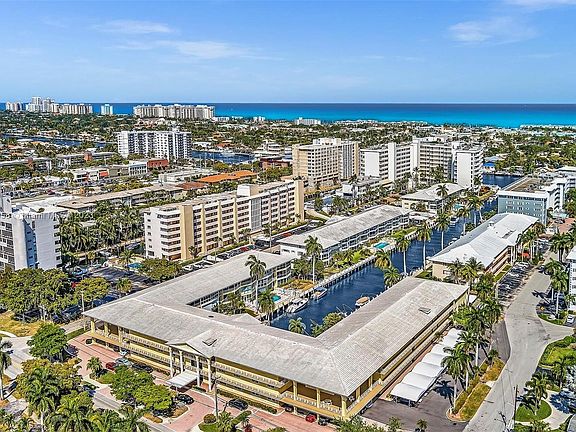 The Wellington a waterfront condominium, steps to Commercial Boulevard, The beach, shops, and more!