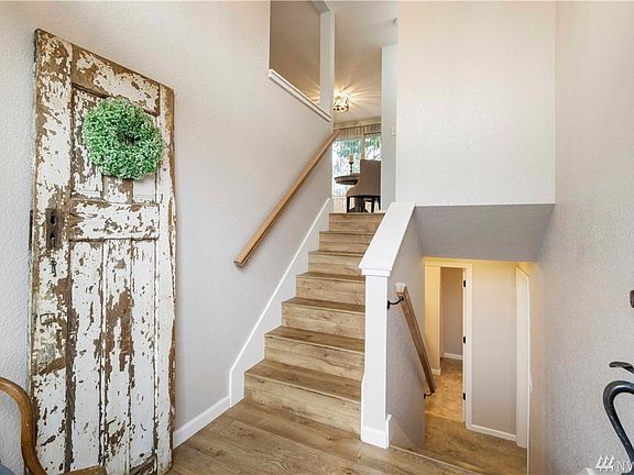 The home has been updated with new flooring and paint, white trim, light fixtures, counter tops and much more! 
