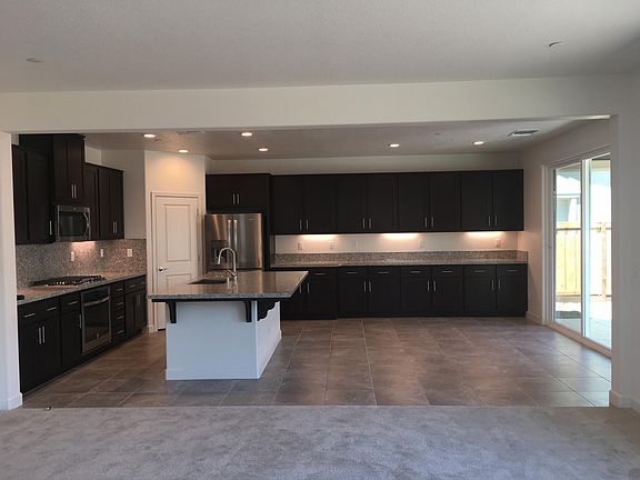 Kitchen with New 4 door Fridge, Additional Nook , with cabi