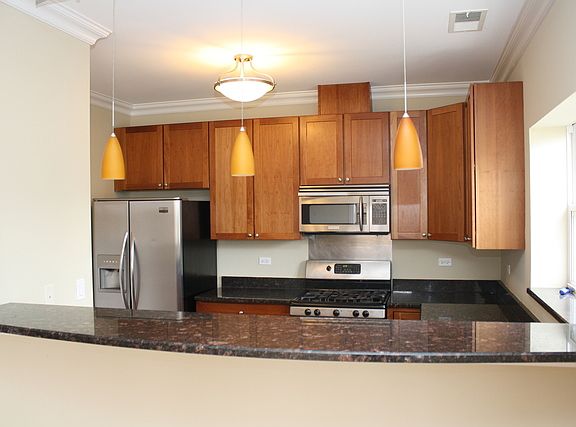 3rd image of 3556 N Long Ave Unit 1E