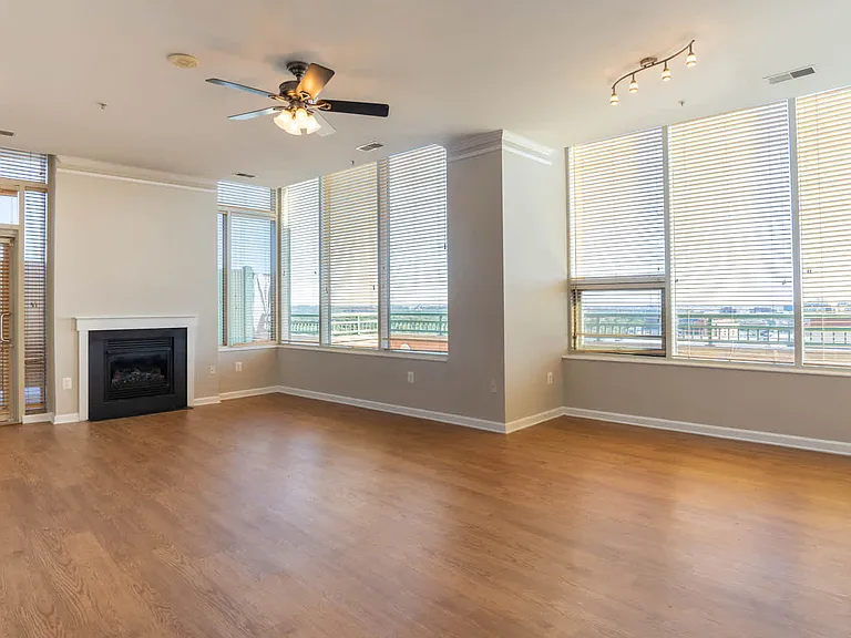Living Room with Fireplace and Balcony