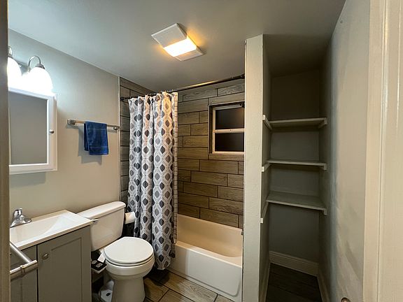Newly renovated bathroom with storage