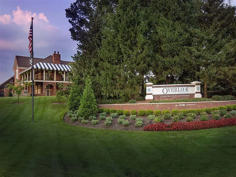 Community entrance at dusk