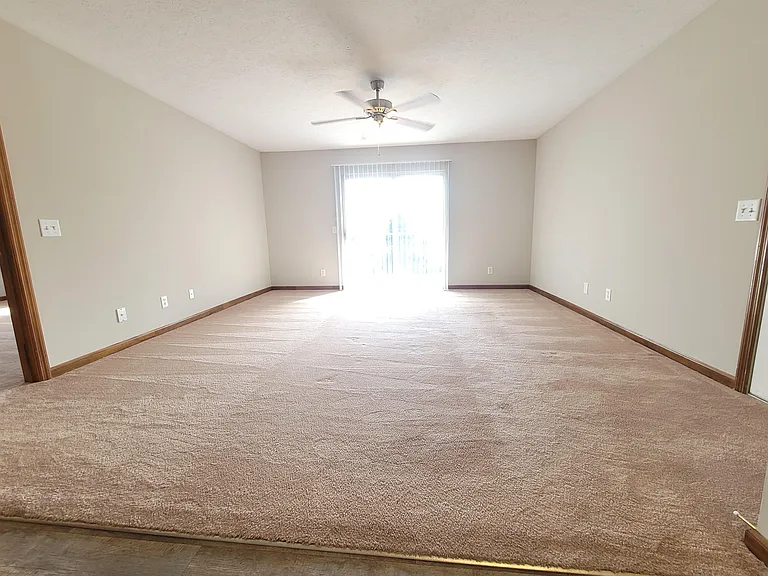 Classic Dogwood | Living Room *wood-look flooring in select units