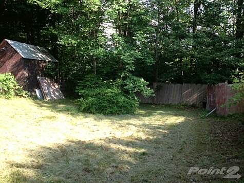 Fenced in back yard, perfect for gardening