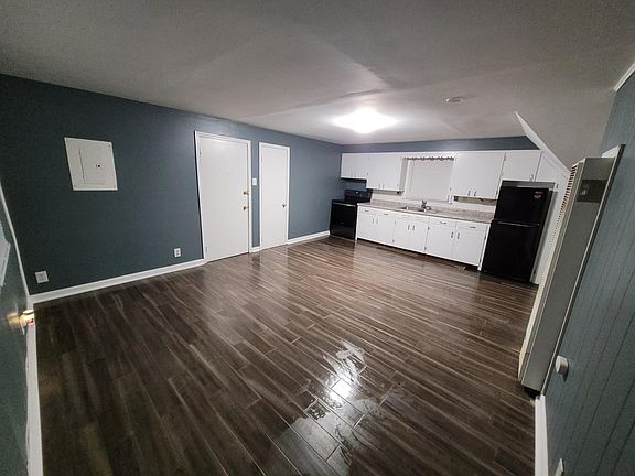 Kitchen and living room area is together.