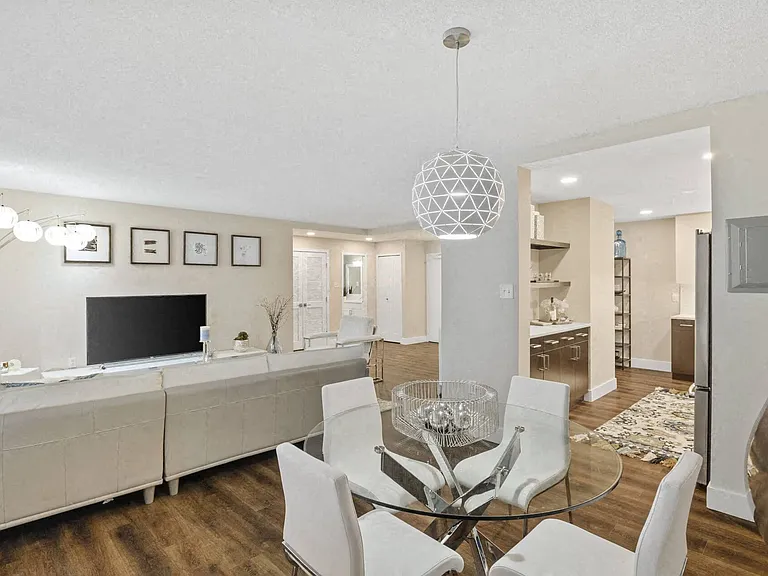 Spacious living areas with hardwood flooring