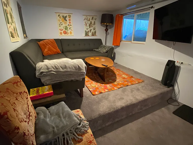Basement TV room with smart TV, seats 7