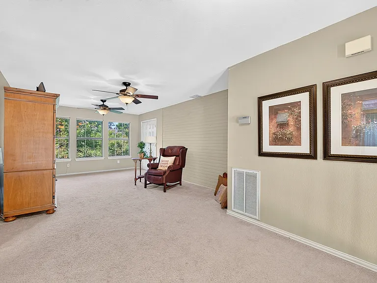 Large upstairs game room with closet, large enough to include an office space